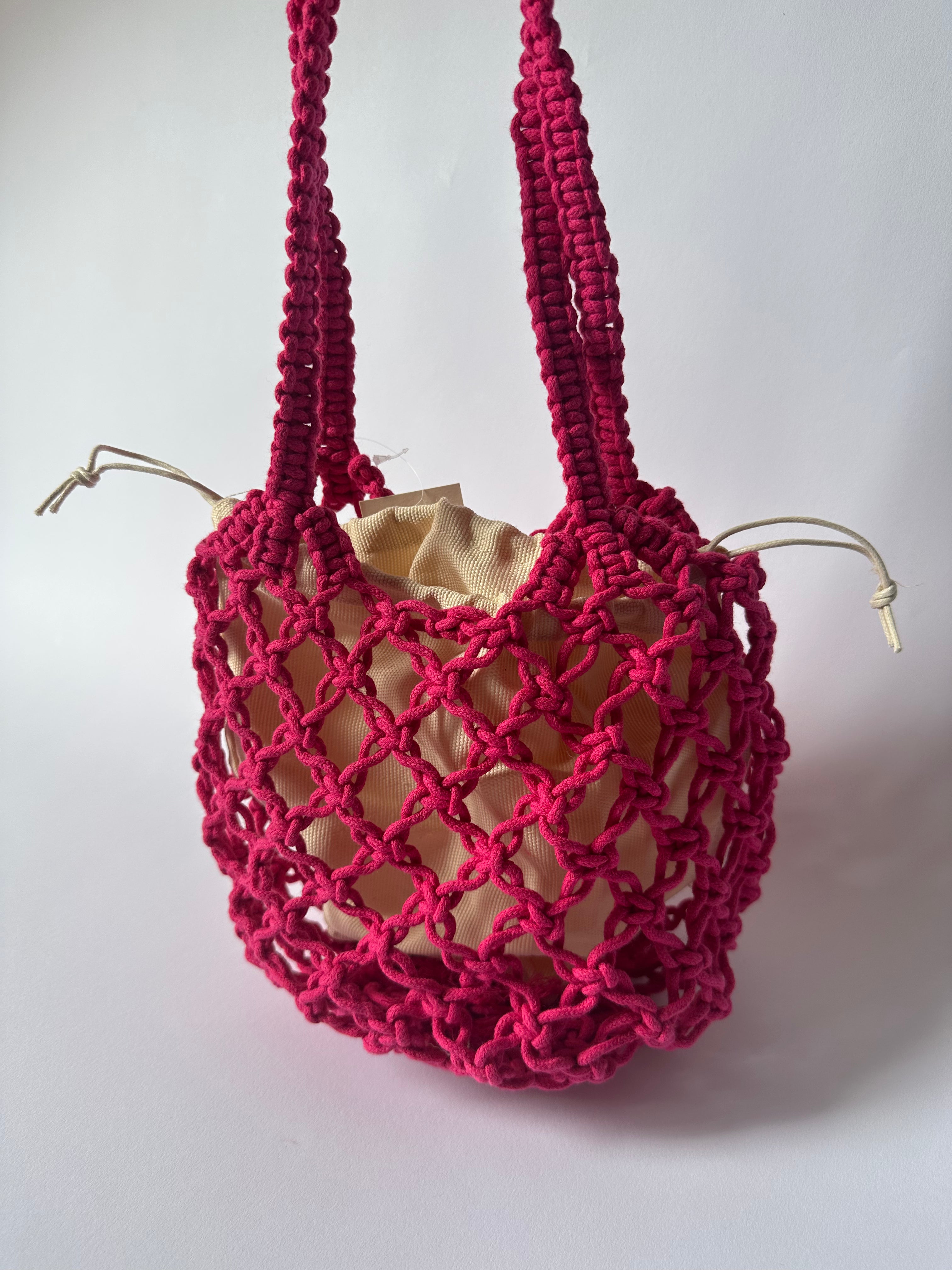 BORSA SECCHIELLO MACRAMÈ FUCSIA