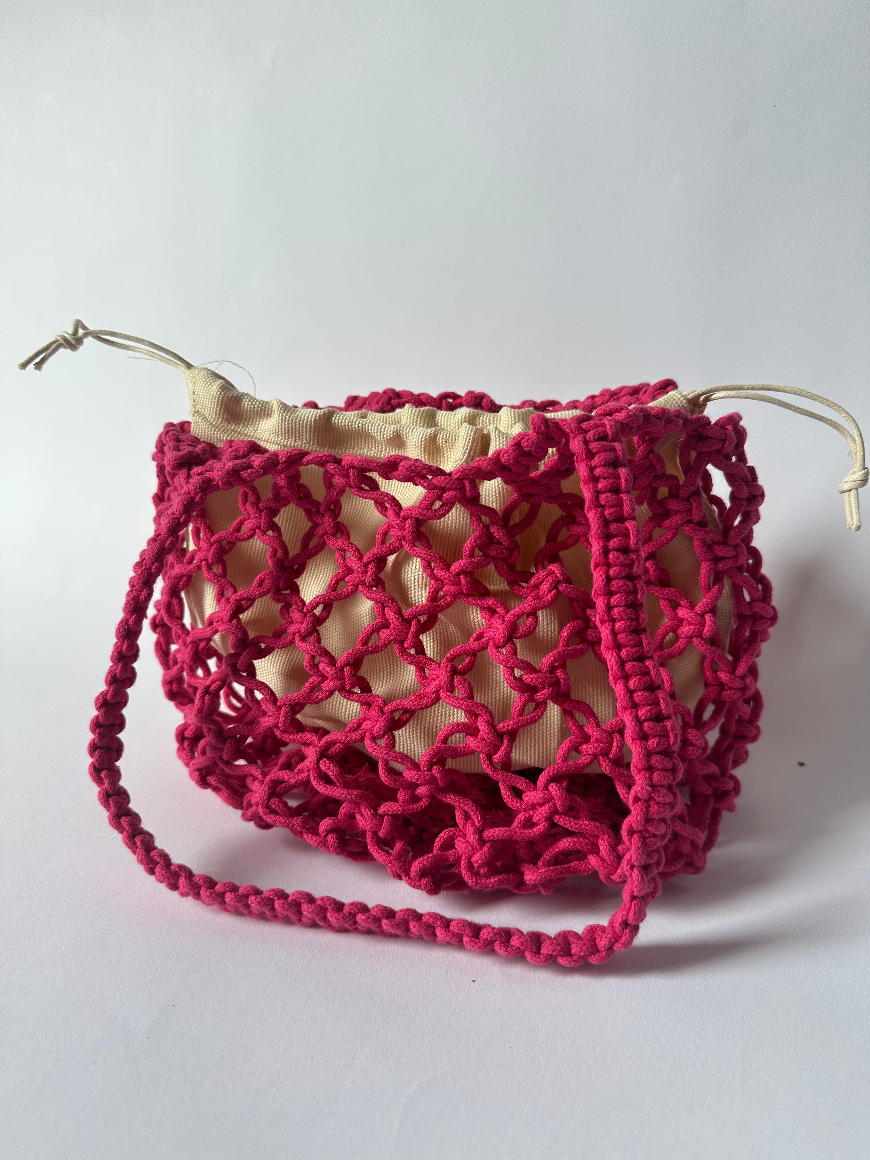 BORSA SECCHIELLO MACRAMÈ FUCSIA